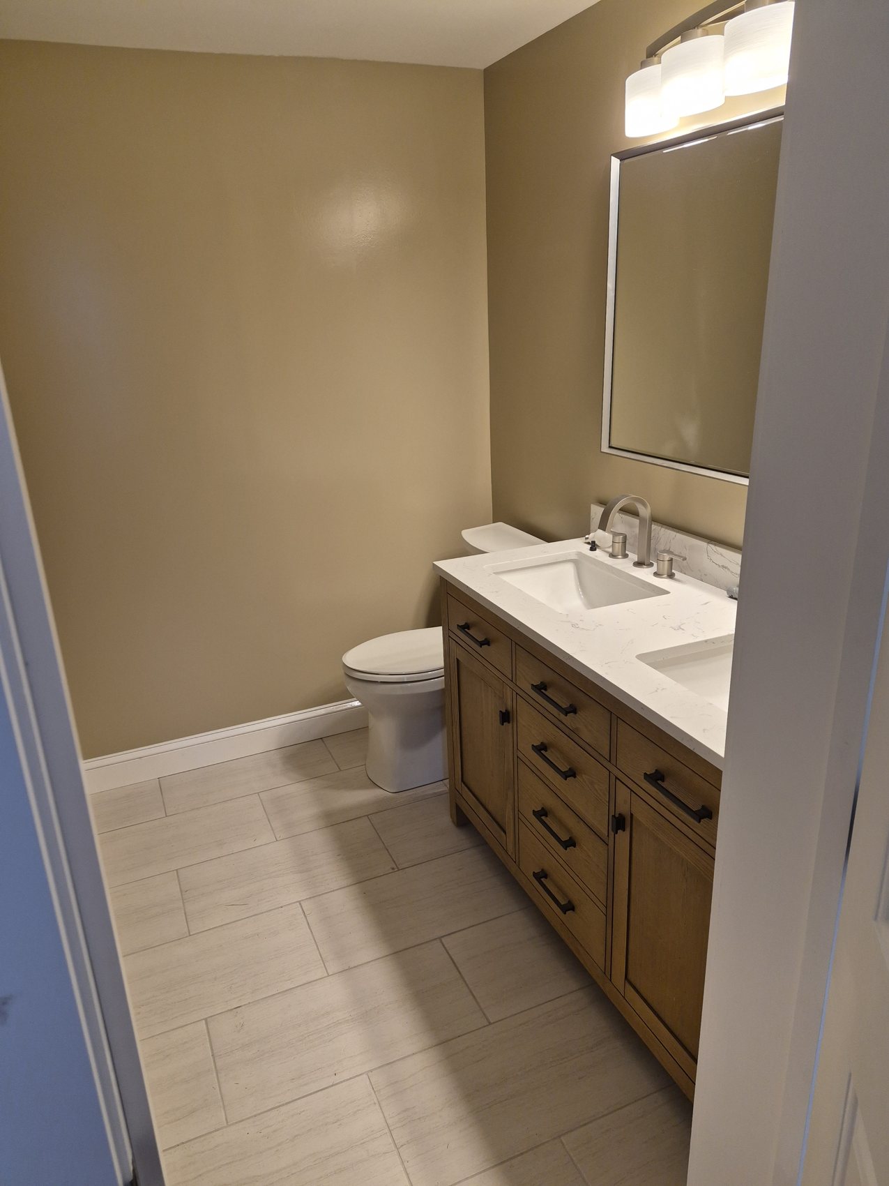 Bathroom remodel by MJY Building & Remodeling