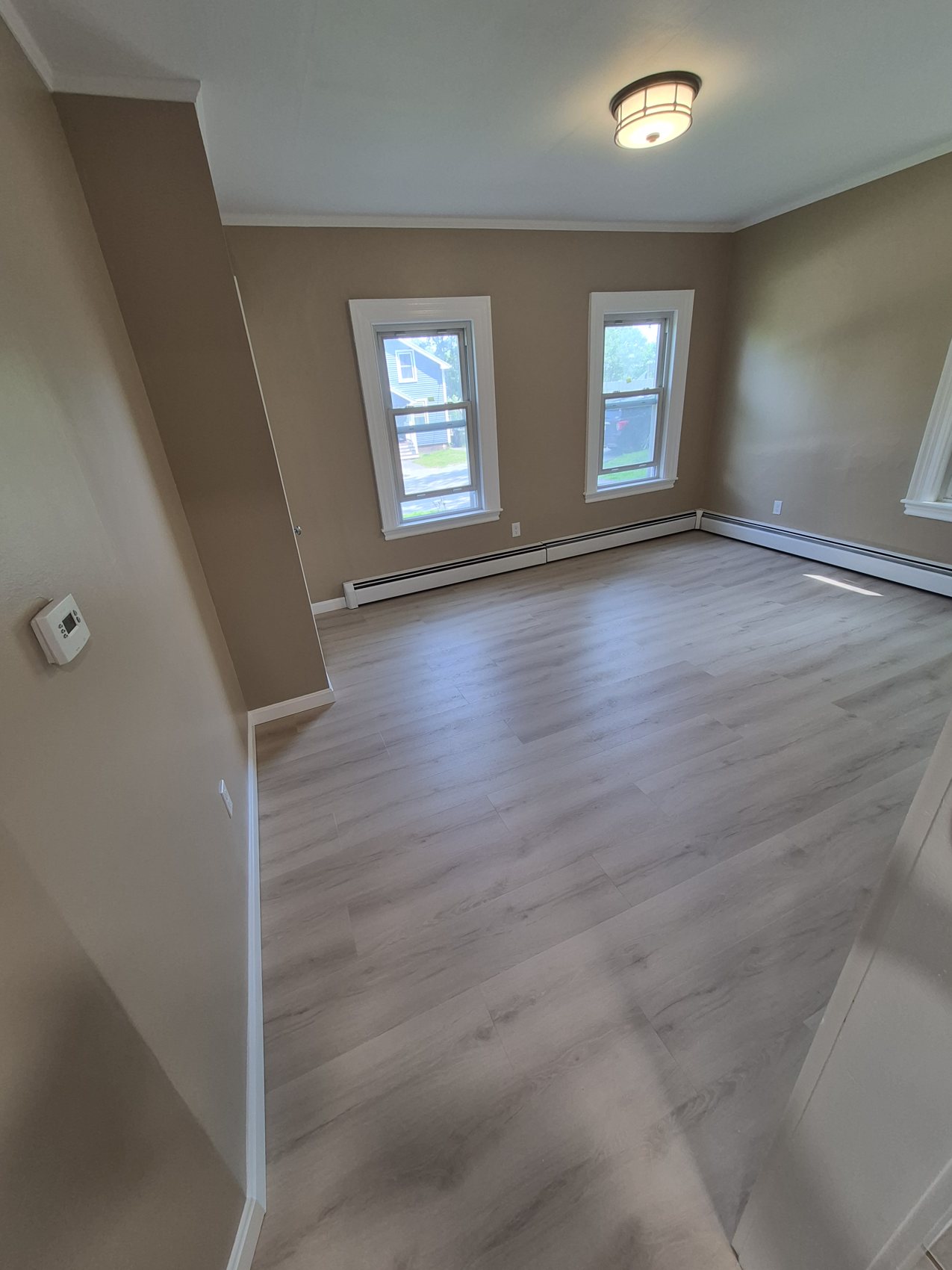 Flooring and finished room by MJY Building & Remodeling